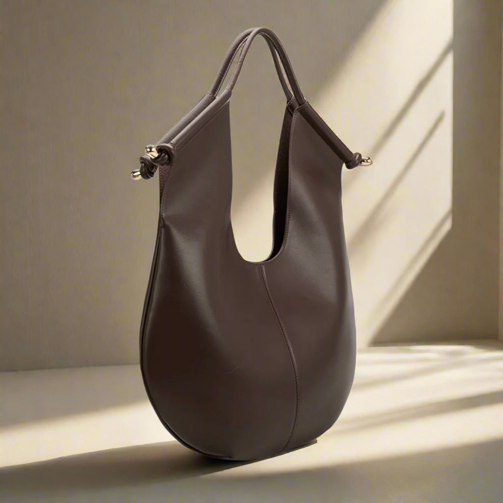 BLACK WOVEN SOLSTICE HANDBAG