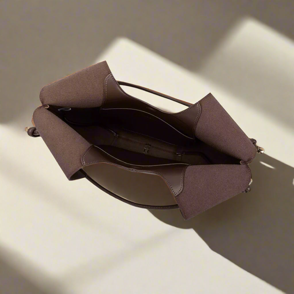 BLACK WOVEN SOLSTICE HANDBAG